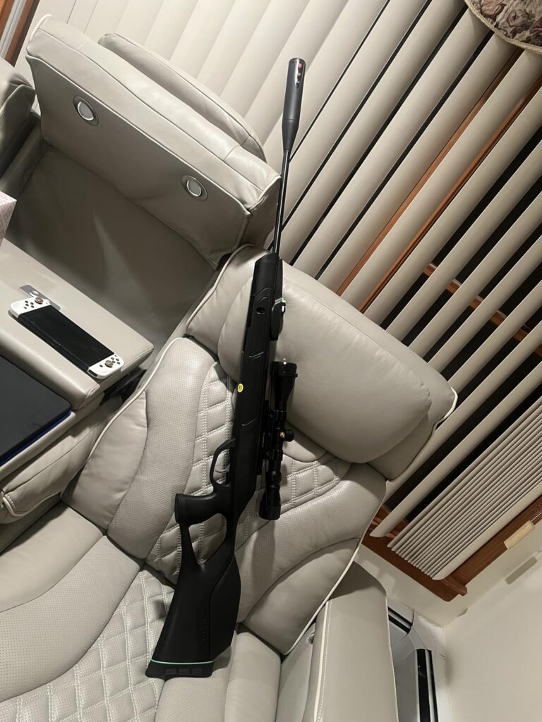 beautiful Gamo Swarm Magnum 10X GEN3i on sofa at home